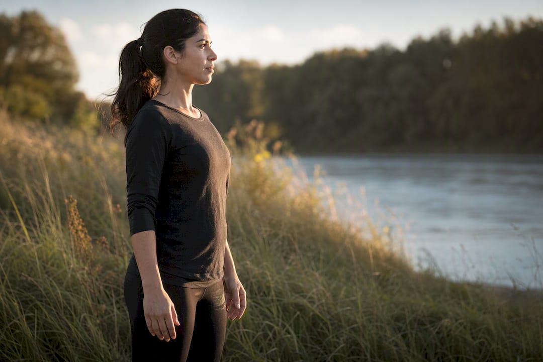 Calm body language with open stance in park