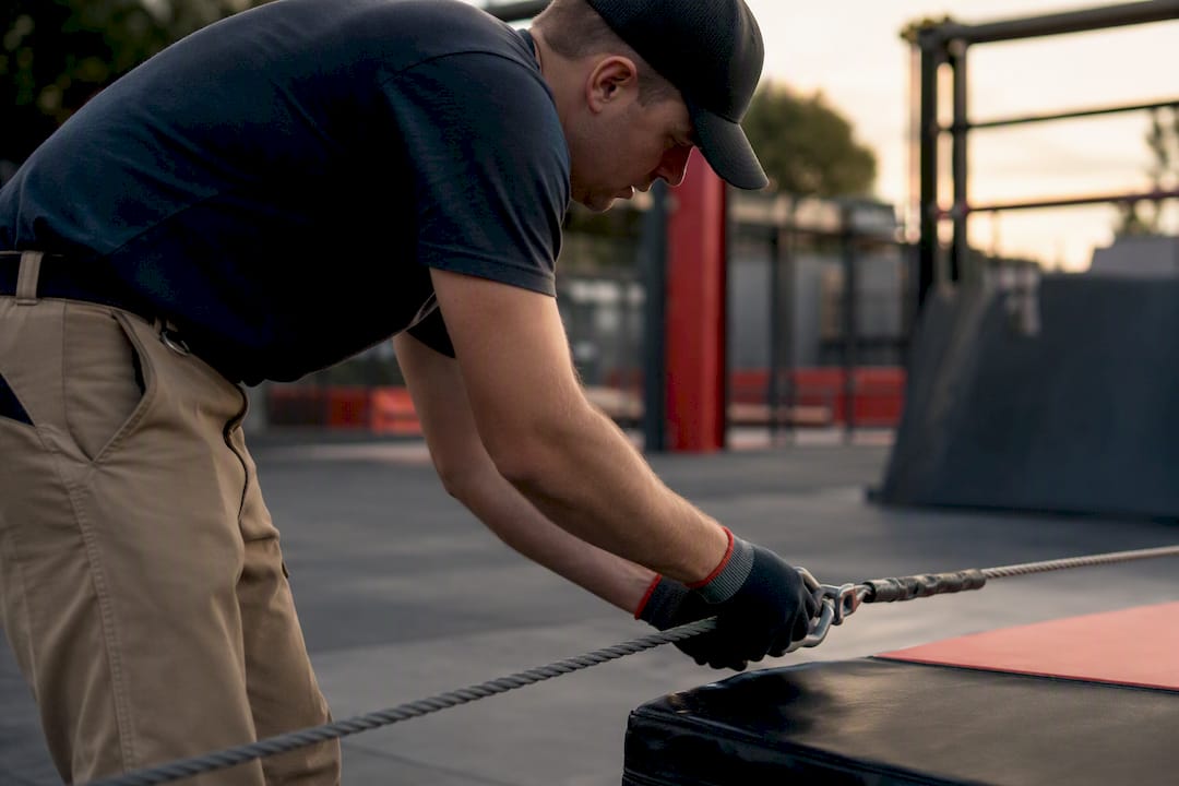 Safety manager adjusting malfunctioning equipment
