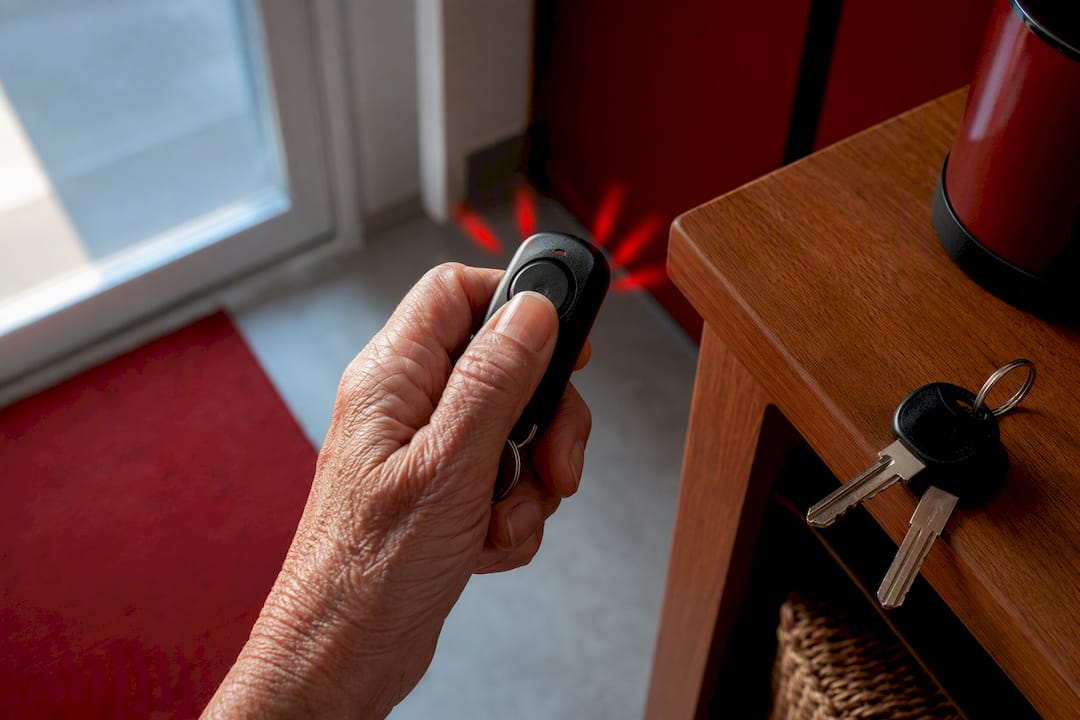 Hand testing a personal safety alarm