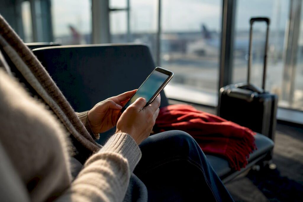 Person using phone on public Wi-Fi